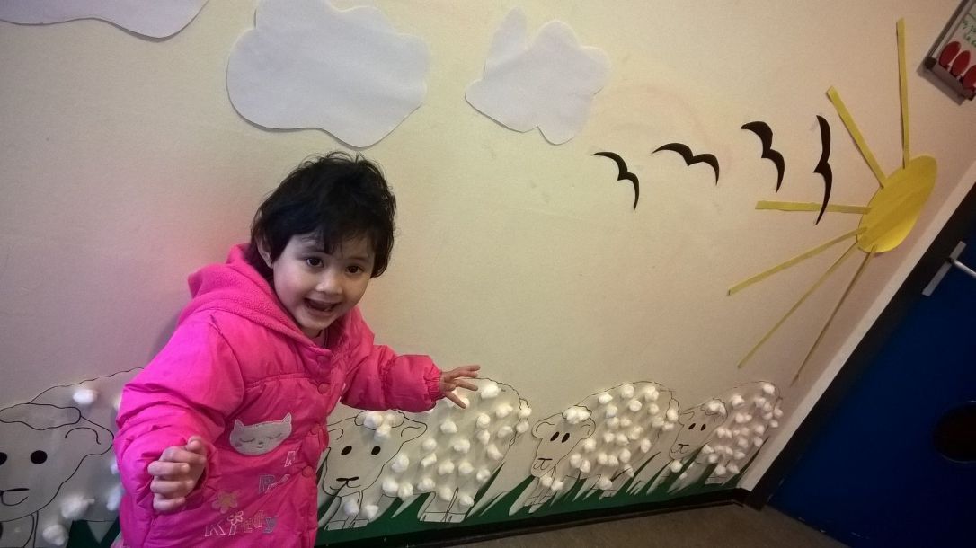 Runa at School. They decorated goats at the wall